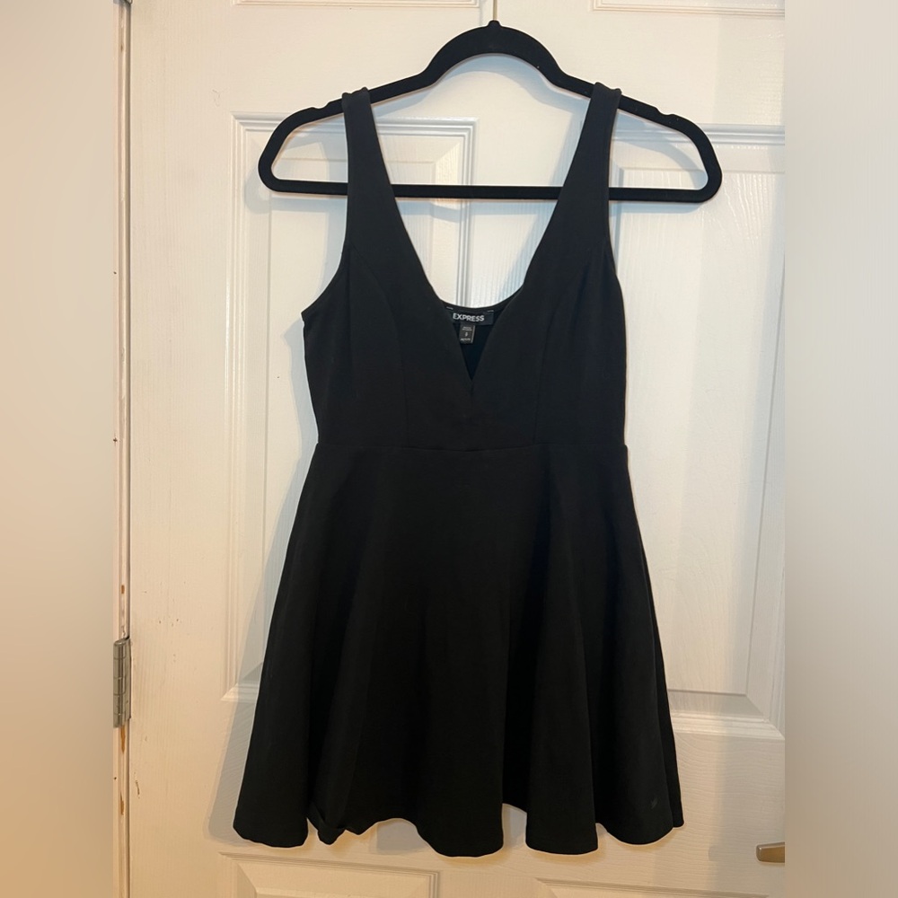 Express black sweet heart neckline mini dress with shorts/skort.